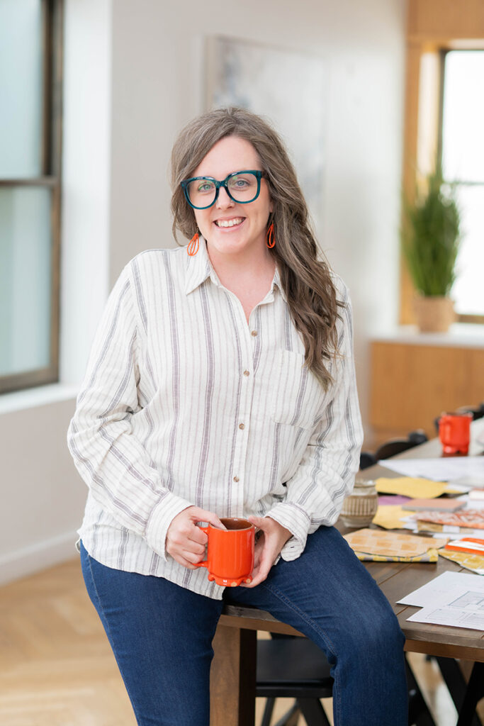 Interior designer in studio specializing in custom interior design, architectural design, and master planning