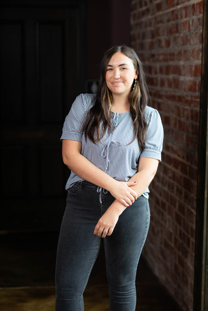 Designer in studio specializing in custom interior design, architectural design, and master planning services